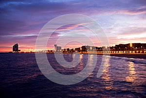 Barcelona beach at the sunset