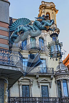 Barcelona. Chinese dragon on House. Catalonia, Spain photo