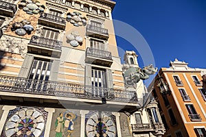 Barcelona. Chinese dragon on House of Umbrellas (Casa Bruno Cuadros) building on La Rambla photo
