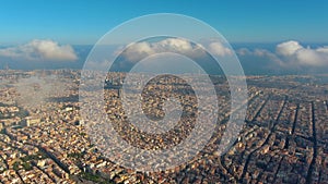 Barcelona City above the clouds and fog, Eixample residential famous urban grid