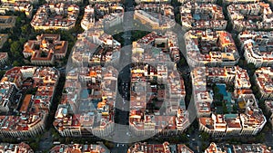 Barcelona city skyline, aerial view. Eixample residential district at sunrise