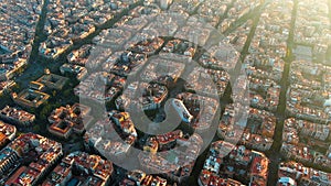 Barcelona city skyline, aerial view. Eixample residential district at sunset