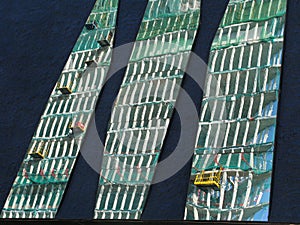 Barcelona construction reflecting on another photo