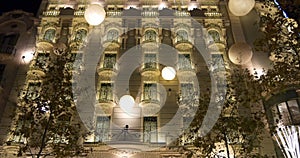 Barcelona night light holiday decoration on building 4k spain