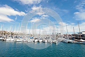 Barcelona port yachts on the sea and sky backgroung photo