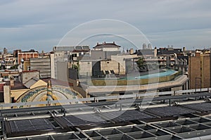 Barcelona residents in different ways using the roofs of their buildings.