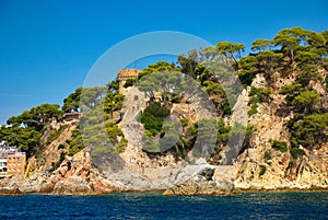 Barcelona, Spain - 18.08.2019: Rocky spanish coast and blue sea in spain