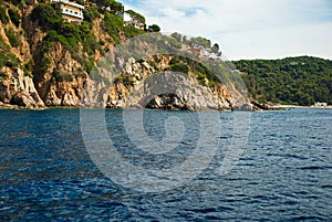 Barcelona, Spain - 18.08.2019: Rocky spanish coast and blue sea in spain