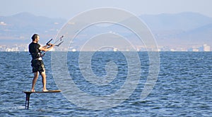 Barcelona, Spain, July 23, 2019: Sportsman Hydro foil kite boarding in Spain at seascape