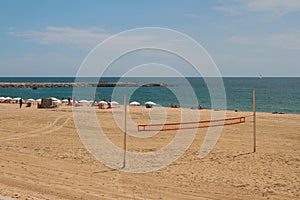 Barcelona, Spain - Jun 13, 2019: Volleyball net, beach and sea