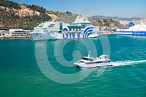 Barcelona, Spain - March 30, 2016: pleasure boat and cruise ships GNV, Grimaldi Lines in sea. Water transportation of