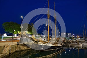 BARCELONA, SPAIN - MAY 16, 2017: View of the sail ship on the pier in center of Barcelona in evening time