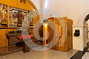 BARCELONA, SPAIN - MAY 16, 2017: Wooden confessional in the catholic Church of Our Lady of Bethlehem Iglesia de La Madre de Dios