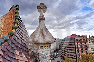 Barcelona, Spain - View of famous rooftop of Casa Batllo designed by Antoni Gaudi, Barcelona, Spain showing scales