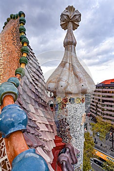 Barcelona, Spain -  View of famous rooftop of Casa Batllo designed by Antoni Gaudi, Barcelona, Spain showing scales