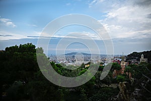 BARCELONA, SPAIN - OCTOBER 15, 2018:  View on Barcelona from Park Guell. Beautiful architecture. Evening sunset panorama