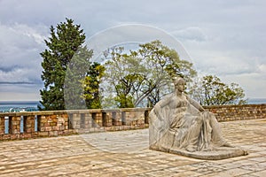 Barcelona, Spain. Sculpture of woman in Montjuic park