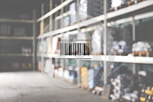 Barcode and blurred view of wholesale warehouse