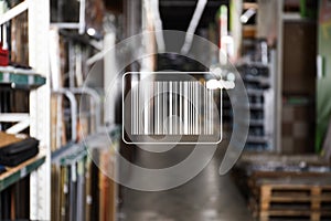 Barcode and blurred view of wholesale warehouse