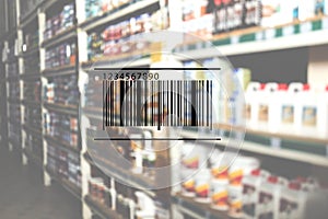 Barcode and blurred view of wholesale warehouse
