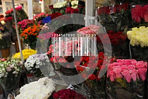 Barcode and fresh flowers at wholesale market