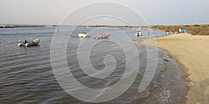 Barcos Rias Tavira Santa Luzia Praia Terra Estreita Algarve Portugal photo