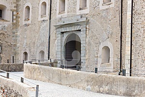 BARD,ITALY/ AOSTA-VALLEY-JUNE 14,2019.Entrance to the fort of Bard impressive military fortress located on a a rock of 444 metres