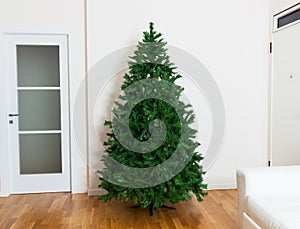 Bare artificial christmas tree