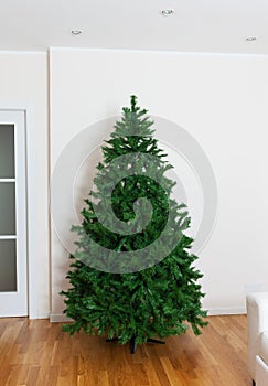 Bare artificial christmas tree