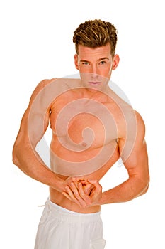 Bare-chested man showing muscles