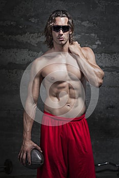 Bare chested muscle man photo