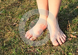 Bare feet on grass