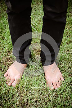 bare feet on green grass