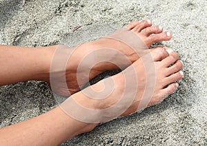 Bare feet on sand