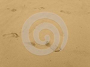 Bare footprints in seasand