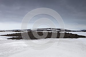 The bare patch in the snow