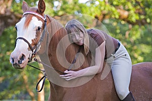 Bareback woman rider hugging her