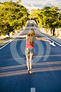 Barefeet balancing woman