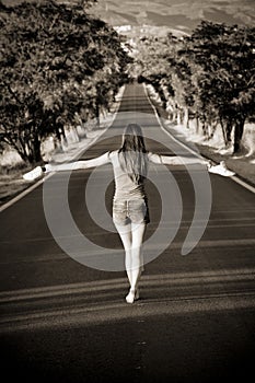 Barefeet balancing woman photo