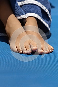 Barefeet Of Child At The Pool