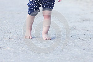 Barefoot child legs