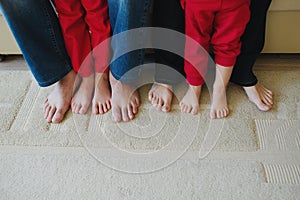 Barefoot family feet at home