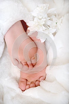 Barefoot with fluffy white plaid and blanket. Relaxation. Comfort aesthetics style