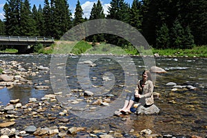 Barefoot in Gallatin River photo