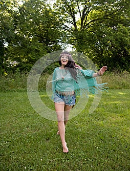 Barefoot Girl Running Through Grass