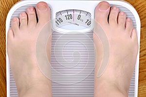 Barefoot person on the scale