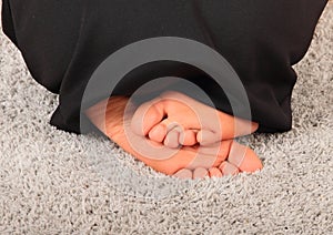 Soles of bare feet of a teenage girl photo