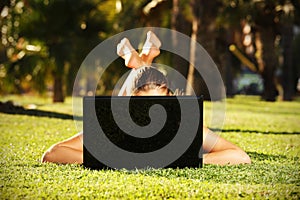 Barefoot woman on the grass