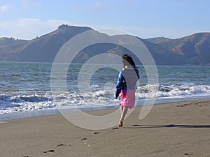 Barefooted beach girl