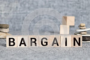 BARGAIN word made with building blocks isolated on white